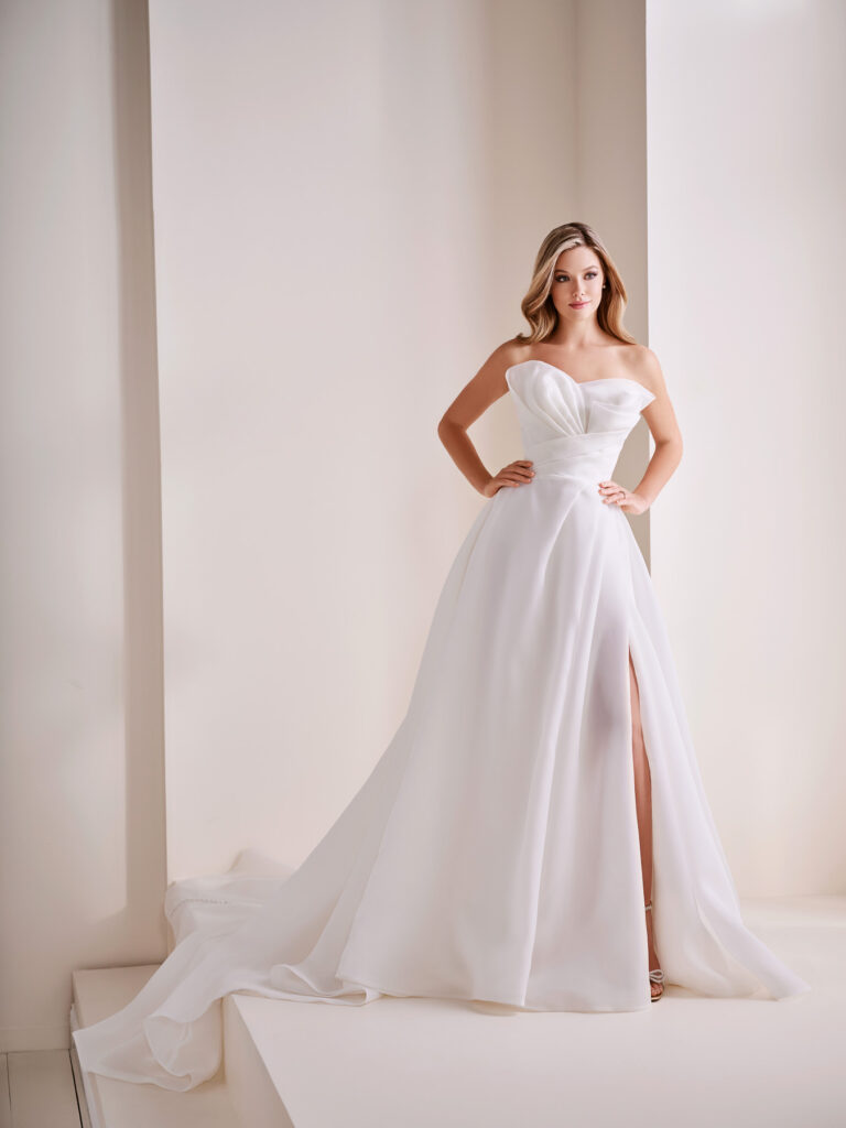 Full-length front view of the E408 ivory A-line bridal gown with square neckline and clean satin skirt